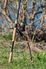 Spinning with cork handle and red reel