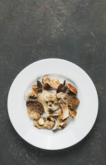 Dried porcini mushrooms on a decorative background