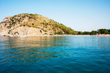 View from the sea of some of the beaches and coves along the littoral of Marina di Camerota. Seaside, coastline. 