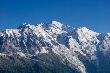 The alps and the nature of mont blanc seen during a beautiful summer day near the village of Chamonix, France - August 2020.