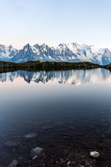 Fototapeta na wymiar Lac Blanc: one of the most famous and beautiful alpine lakes surrounded by the mont blanc alps, near the village of Chamonix - Mont blanc, France - August 2020.