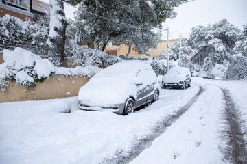 Fototapeta na wymiar Beautiful winter morning snow covered streets of Athens, Greece, 16th of February 2021.