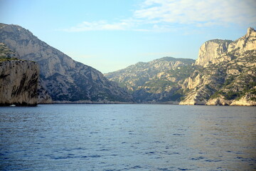 Creek with cliffs at sunset, between lights and shadows, Parc National des Calanques, Marseille, France