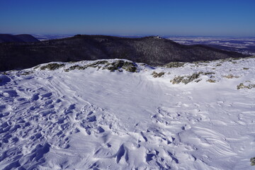 View from the top of Breitenstein on the Swabian Alb, with trees, far view, snow, wintertime, Ochsenwang near castle Teck, Bissingen unter Teck, Germany