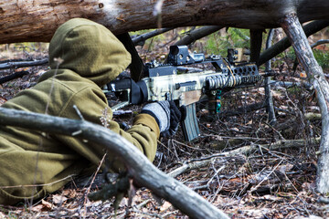 Airsoft soldier in the woods