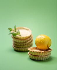 Stacked traditional french tart with lemons on top