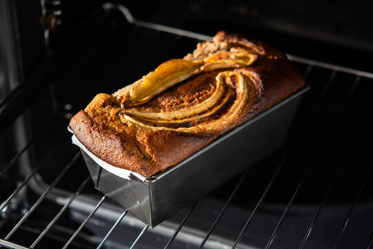 From above healthy banana bread in container in oven