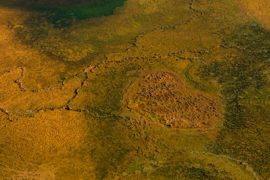 Spectacular drone view of green terrain with rocks and lakes in Minas de Rio tinto