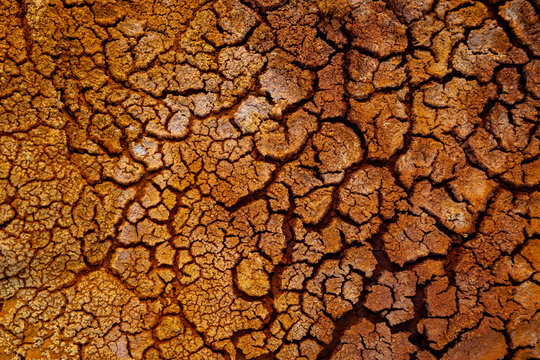 Top view of textured background of dry cracked earth in Minas de Rio tinto