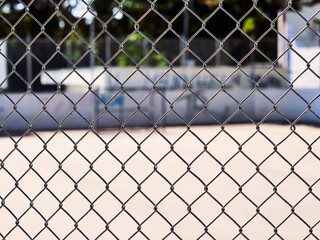chain link fence with barbed wire