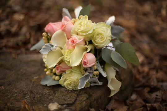 Wedding Photograph Bridal Bouquet White and Pink Roses, Lily, and Dusty Miller Floral Arrangement