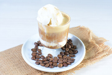 
Coffee and chocolate milkshakes, with chantilly cream on white wooden background