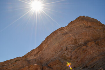 sun burst on the top of Vasquez Rocks
