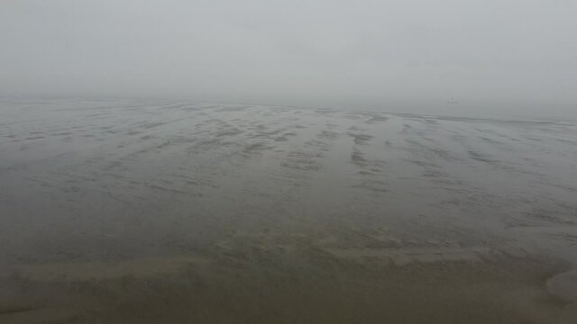 Flight over the Wadden Sea in Germany at the city of Cuxhaven - aerial view