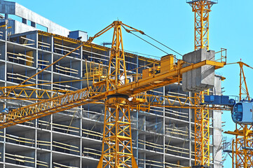 Crane and highrise construction site