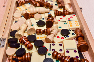 Fototapeta na wymiar checkers, chess, dominoes and backgammon. set of board games.