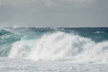 waves crashing on the rocks