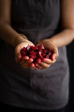 Red beetroot in hand