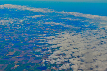 Naklejka na ściany i meble Aerial View of Clouds over Farm Land in Argentina