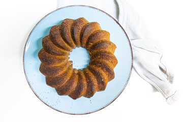 Organic vegan oatmeal cake on blue plate and white background.gluten free