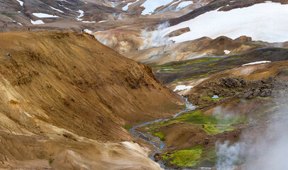 Hikers in the geothermal area of Hveradalir in the mountains of Kerlingarfjoll in the highlands of Iceland.