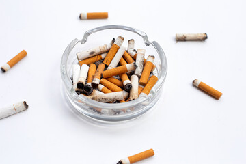 Smoked cigarettes on white background.