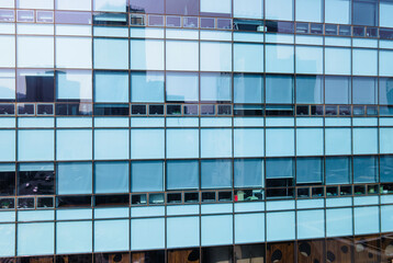 A mirror wall of modern building close-up, modern architecture