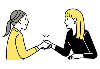 ミーティングをする女性　2人　握手