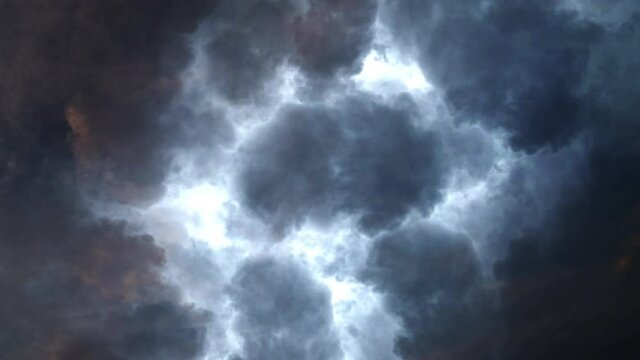 a thunderstorm that was going on inside a dark cloud with its image