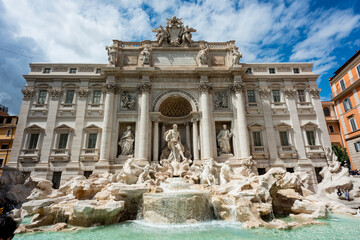 Fototapeta na wymiar Italy, Rome. The Trevi Fountain, designed by Nicola Salvi. Aqua Virgo, 'Ocean' in center and four allegorical figures on sides representing value of rain to agriculture, prairies and gardens.