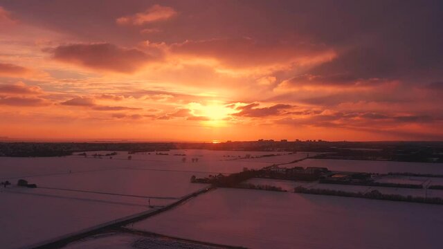 Aerial shot amazing sunset with grade dark shaded snow fields below. Impressive clouds and vivid epic colours
DJI MAVIC 2 PRO HD 60fps