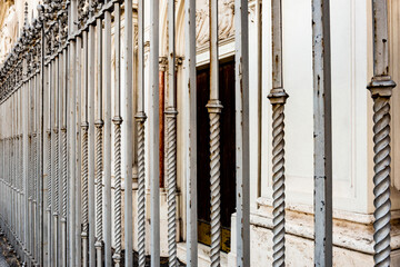 Obraz premium Italy, Rome. Detail of building facade with iron fencing.