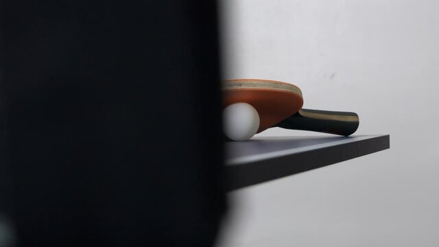 Table tennis concept ping pong racket ball and net, Rack focus, Slide