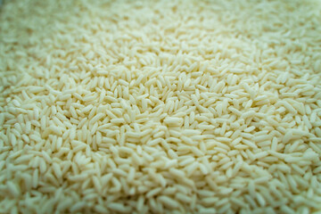 Close up of white raw sticky rice.
