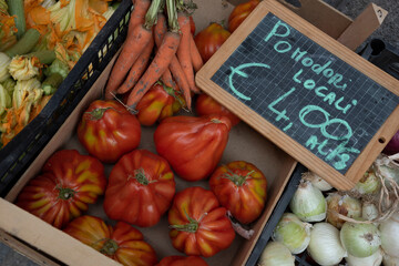 Italy, Piedmont, Alba, ripe tomatoes in an outdoor market