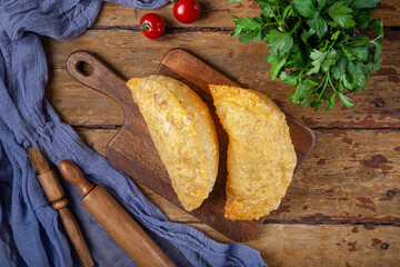 Close-up deep fried national asian pie cheburek, traditional homemade patty
