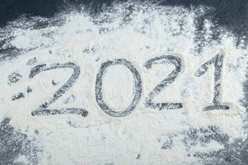 2021 writing with fingertips on the white snow