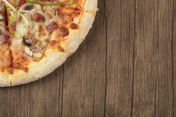 Cooked pizza dough with mixed chopped and minced ingredients