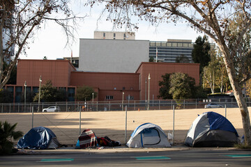 A homeless encampment sits on a street in Downtown Los Angeles, California, USA.