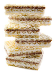 A high stack of delicious waffles is isolated on a white background.