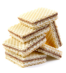 Delicious crisp waffles are isolated on a white background.