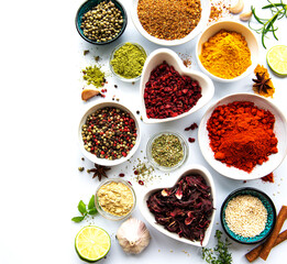 Various spices in a bowls  on white  background. Top view copy space.