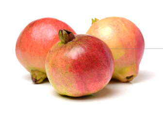 Juicy pomegranate on white background