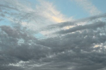 white cloud shapes on blue summer sky