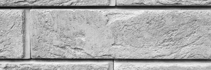 pattern of decorative gray slate stone wall surface as a background. tinted gray. banner