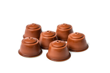 set of coffee capsules, roasted beans isolated on white background Top view Flat lay Drink obtained from dosed capsule with roasted, ground and compressed natural coffee