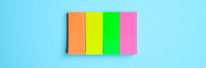 Colorful stationery. Multicolored sticker on blue background. banner