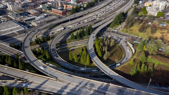 Cinematic time-lapse hyperlapse clip of the I-5 I-90 freeway interchange near downtown, Central Business District of Seattle, First Hill in Washington state