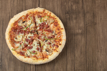 Cooked pizza dough with mixed chopped and minced ingredients