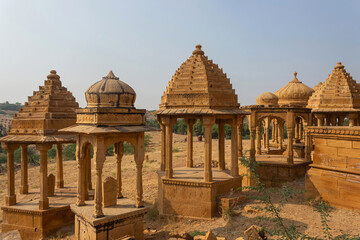 Golden Cenotaphs or Chhatris of Bada Bagh or Barabagh carved out of sandstone blocks, Jaisalmer, Rajasthan, India.
